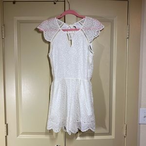 White Express Romper with open back